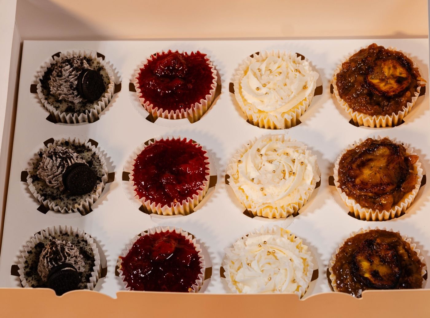 A Maxi Cup Club box of 12 cheesecake cups in four flavours